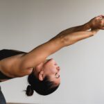 woman stretching arms