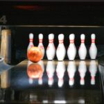 bowling ball going to hit bowling pins